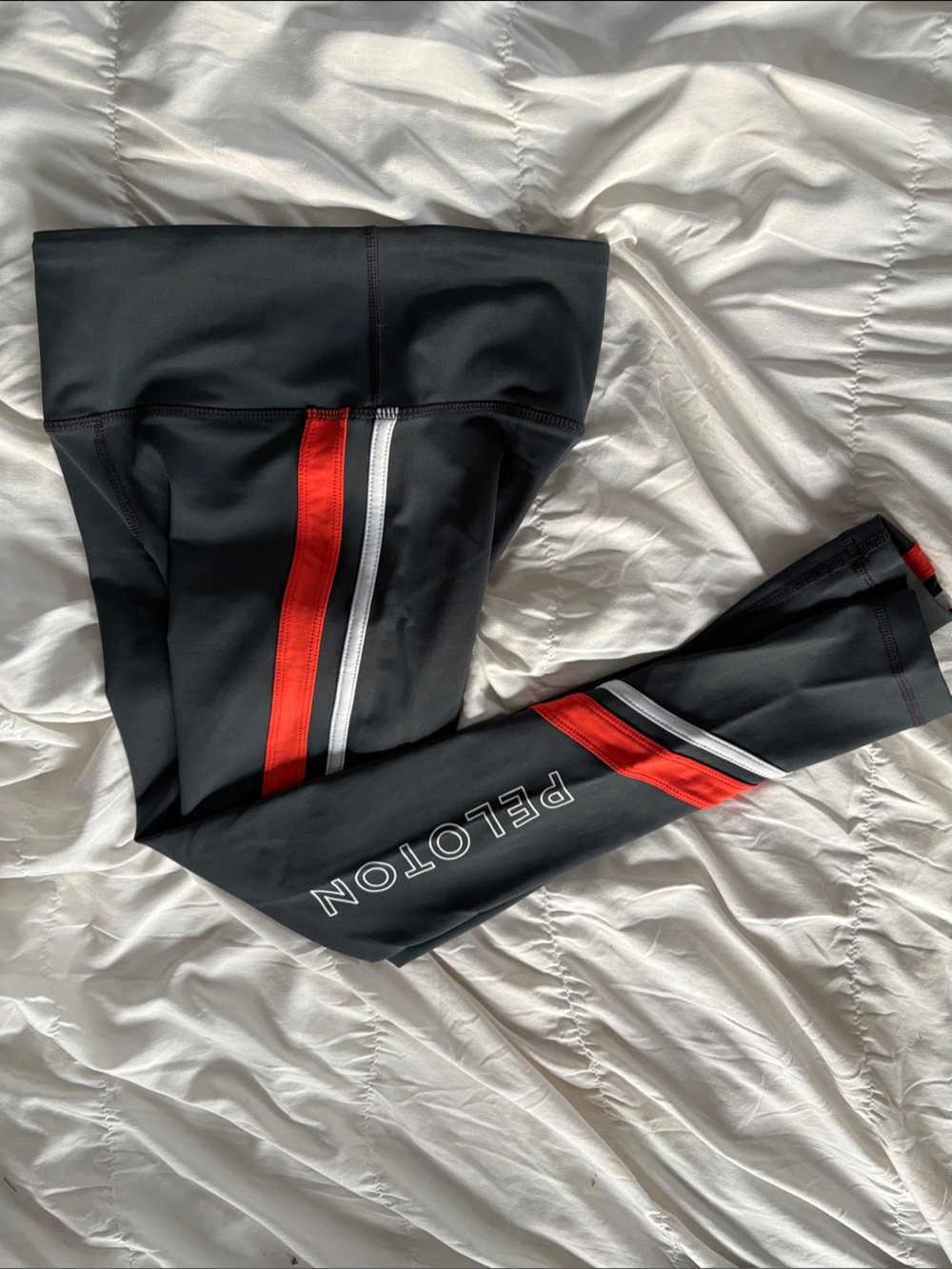 Peloton Grey Leggings with Orange and White Stripe Accents